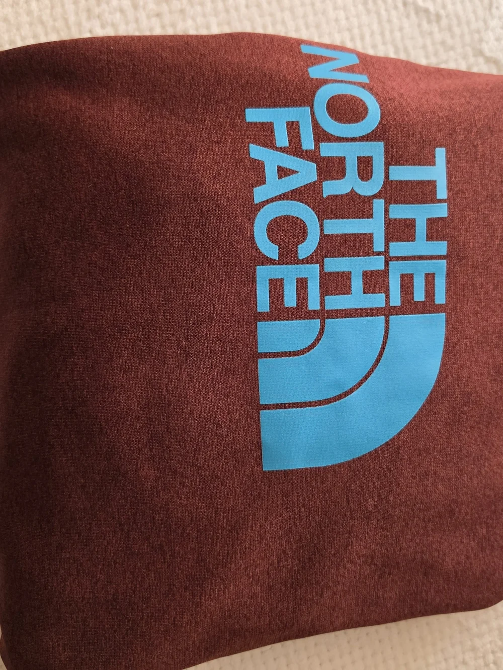 The North Face Maroon Hoodie with Bright Blue Accents